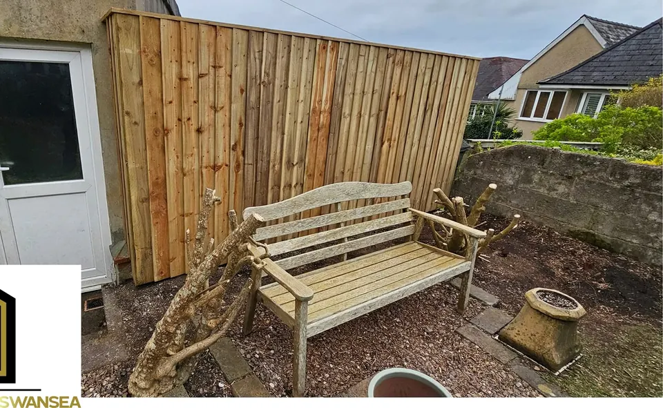 New close-board fence and garden bench