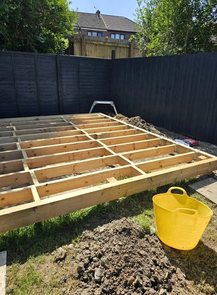 Timber joist frame laid in a back garden