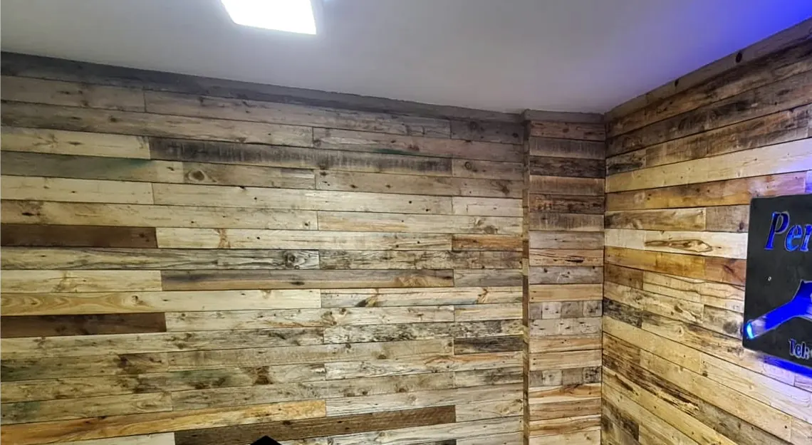 After: walls lined in reclaimed wood